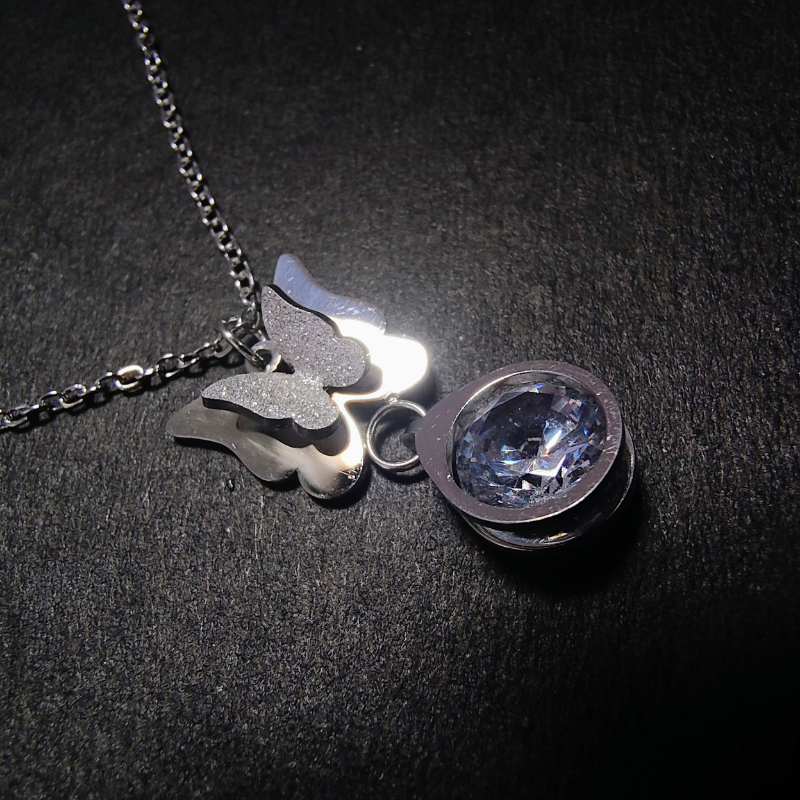 Elegant Two-Tone Butterfly Necklace with Sparkling Gem
